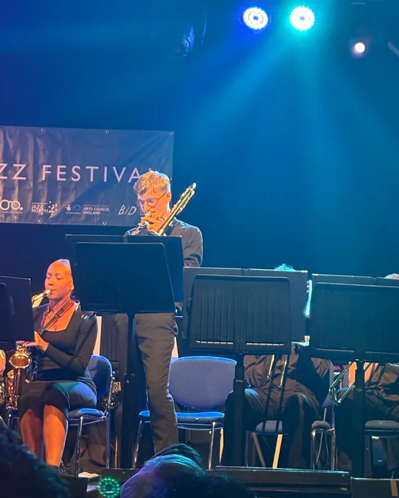 Solo trombone performance at a jazz festival